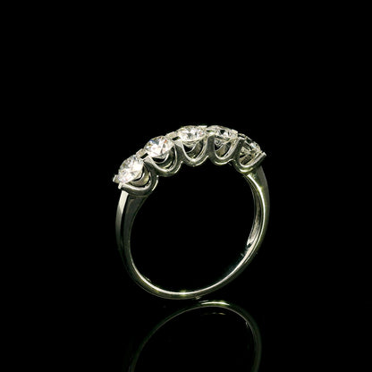 Five stone diamond band ring in 18K white gold with round brilliant diamonds set across the front