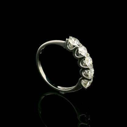 Five stone diamond band ring in 18K white gold with round brilliant diamonds set across the front