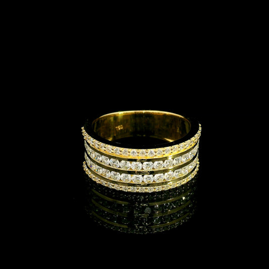 Wide diamond band ring in 18K yellow gold featuring four rows of round diamonds separated by polished gold bands.