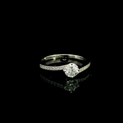 GIA certified round diamond engagement ring in 18K white gold with curved diamond band