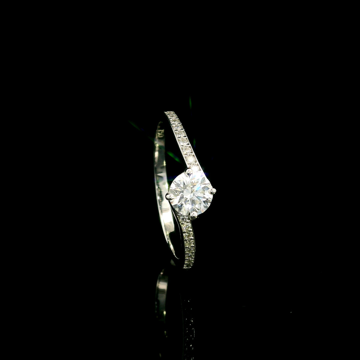 GIA certified round diamond engagement ring in 18K white gold with curved diamond band