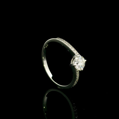 GIA certified round diamond engagement ring in 18K white gold with curved diamond band