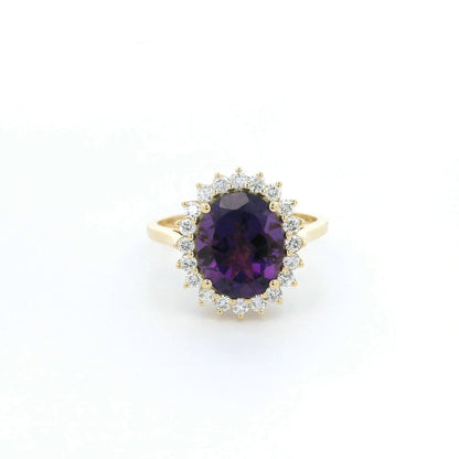 Oval amethyst and diamond halo ring in 18K yellow gold
