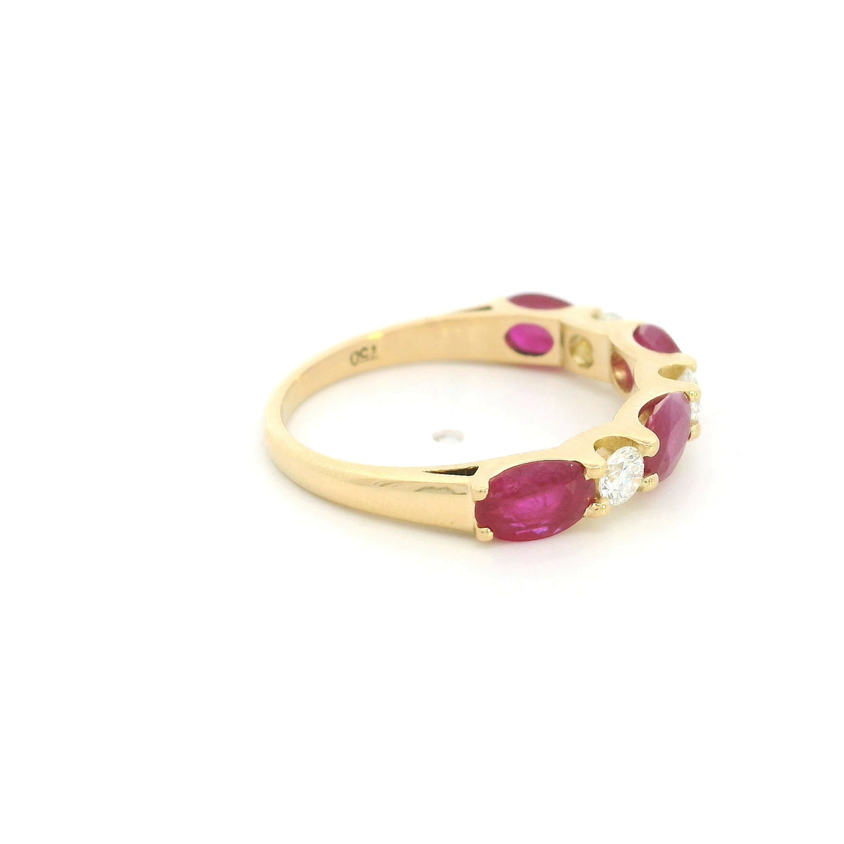 Ruby and diamond ring in 18K yellow gold with alternating oval rubies and round diamonds