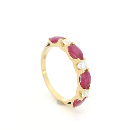 Ruby and diamond ring in 18K yellow gold with alternating oval rubies and round diamonds