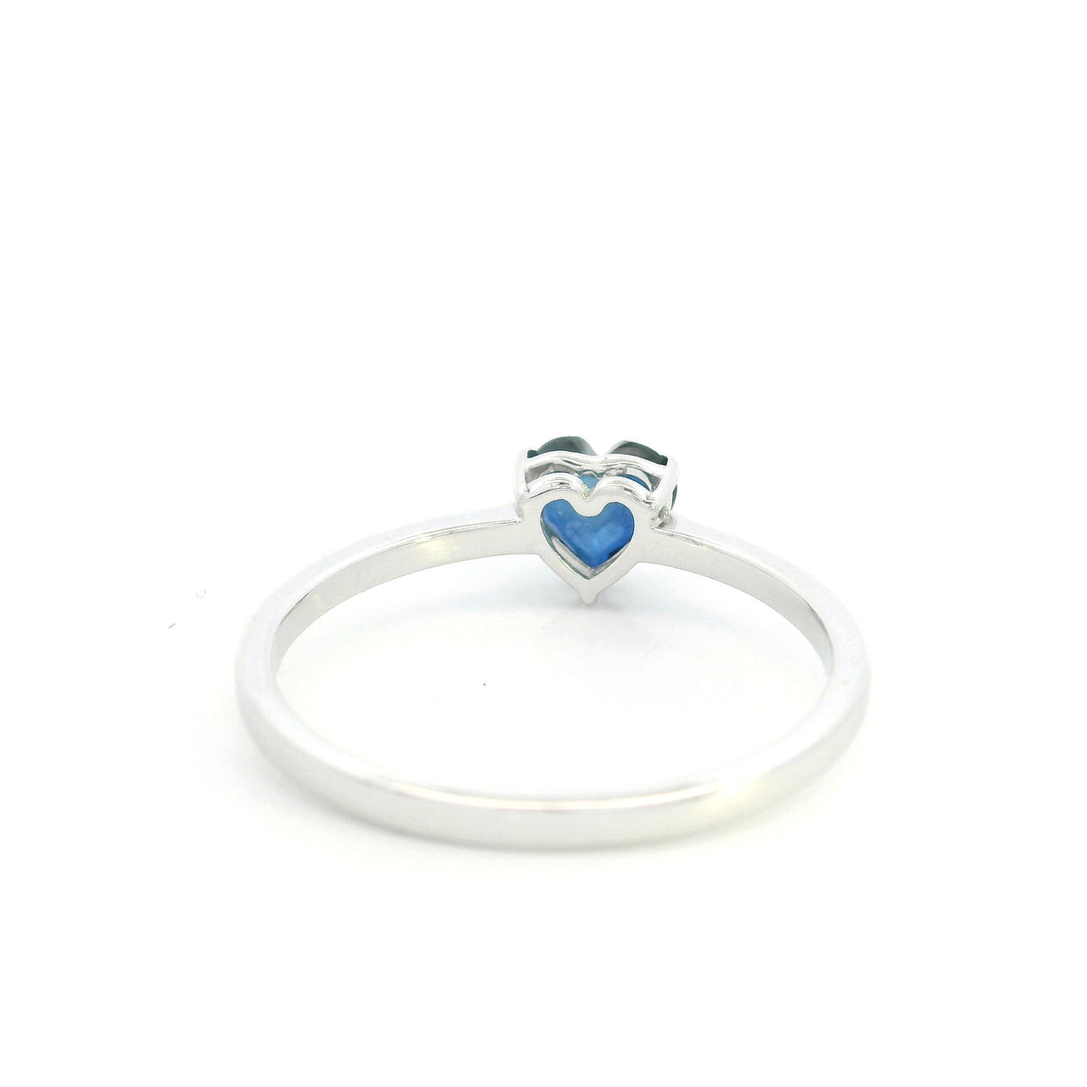 Heart shaped blue sapphire ring in 18K white gold