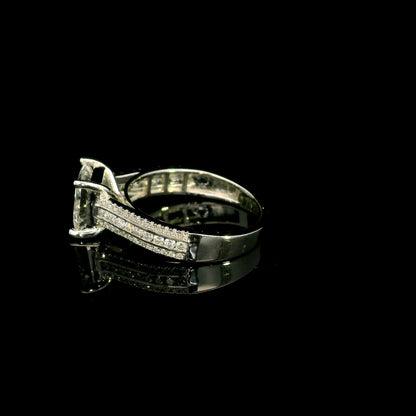 Natural princess cut diamond engagement ring in 18K white gold featuring a 2.19 carat IGI-certified F colour VS1 clarity centre diamond and 0.42 carat of round diamonds along the pavé-set band.