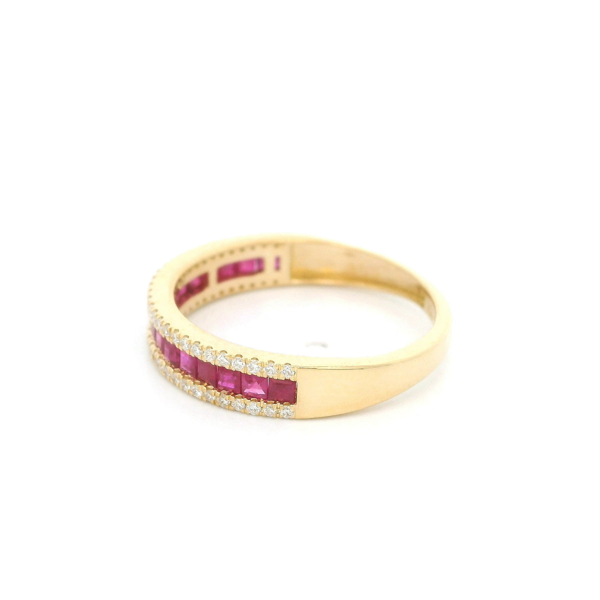 18K yellow gold band ring with a row of square-cut red rubies bordered above and below by small round diamonds.