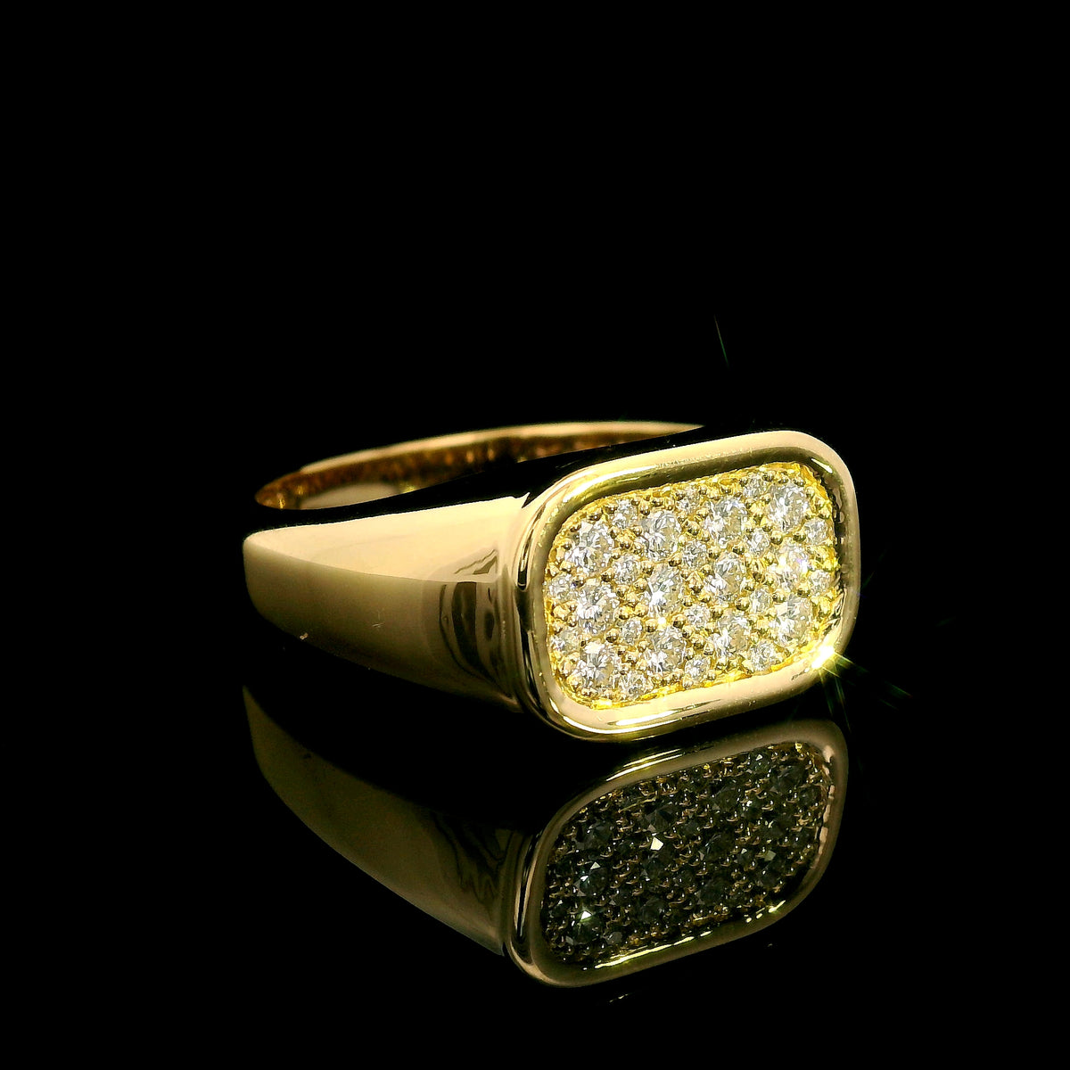 18K yellow gold pavé diamond signet ring with a rectangular diamond-set top and polished tapered band.