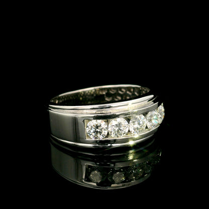 Men's 18K white gold band with five round diamonds in a channel-style setting framed by broad polished gold edges.