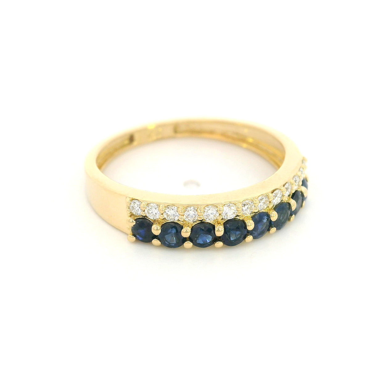 18K yellow gold band ring with two adjacent rows of round blue sapphires and white diamonds across the front.