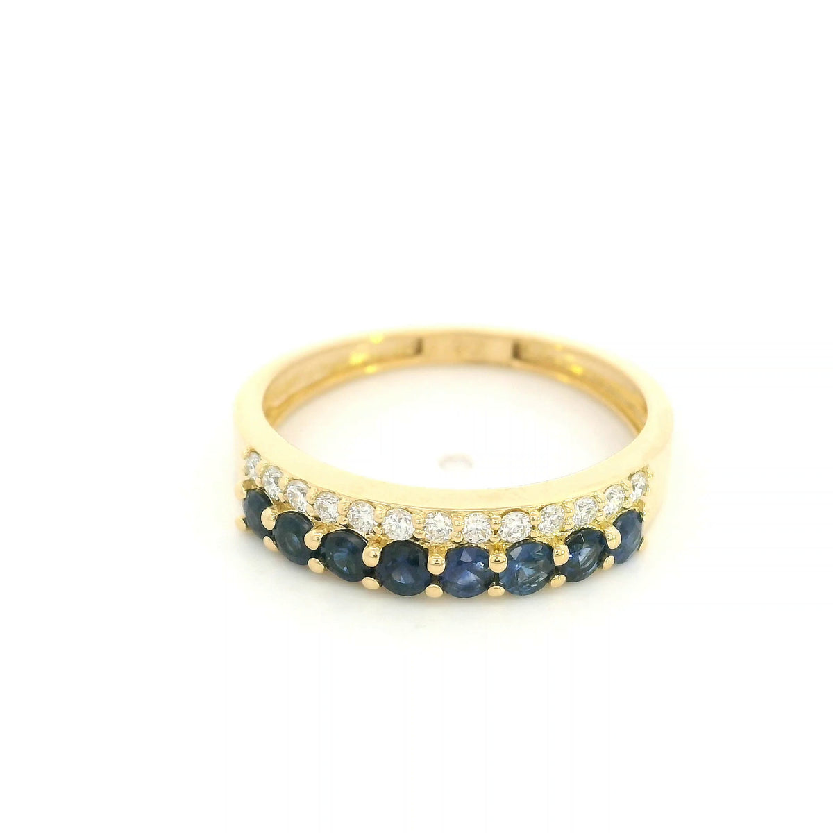 18K yellow gold band ring with two adjacent rows of round blue sapphires and white diamonds across the front.