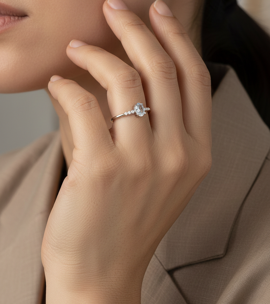 Oval aquamarine ring 0.47 carat with diamond accents in 18K white gold by Emirates Diamonds