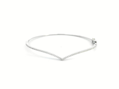 18K gold V-shape bangle bracelet with 0.34 carats of round-cut diamonds, featuring a modern tapered silhouette and minimalist design.