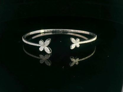 18K gold butterfly bangle with 0.86 carat pavé diamonds in open cuff design

