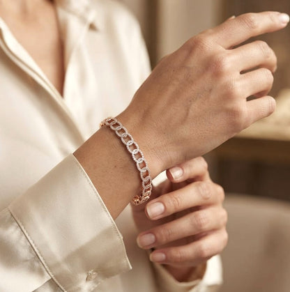 18K rose gold diamond link bangle with 1.26 carats of natural round diamonds