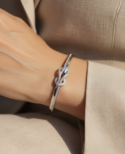 18K white gold diamond knot bangle with pavé-set natural diamonds by Emirates Diamonds