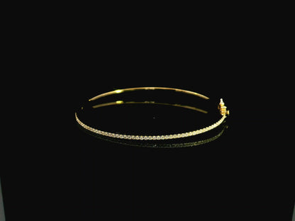 18K yellow gold diamond bangle featuring 0.54 carat natural diamonds in an elegant open bangle bracelet design.