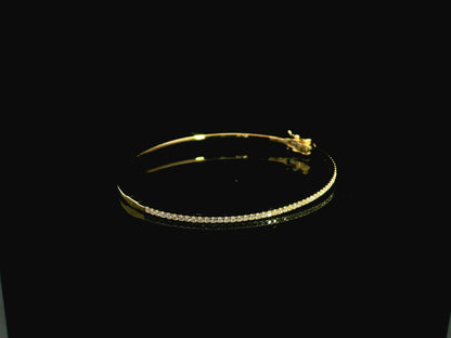 18K yellow gold diamond bangle featuring 0.54 carat natural diamonds in an elegant open bangle bracelet design.