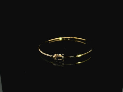 18K yellow gold diamond bangle featuring 0.54 carat natural diamonds in an elegant open bangle bracelet design.