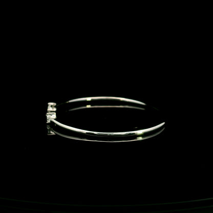 18K white gold open cuff bangle featuring pear-shaped natural diamonds with a total diamond weight of 0.61 Carat.