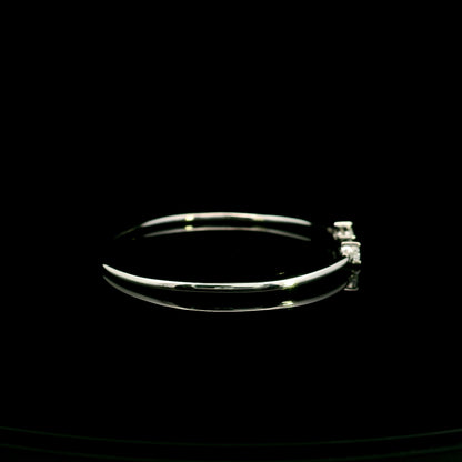 18K white gold open cuff bangle featuring pear-shaped natural diamonds with a total diamond weight of 0.61 Carat.