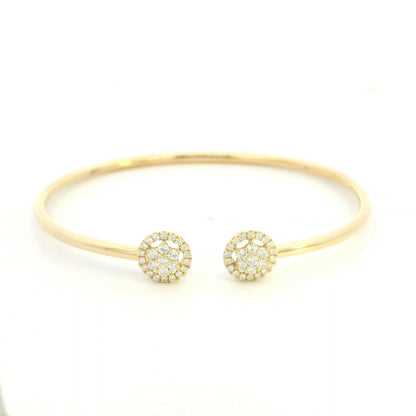 18K yellow gold open cuff bangle with two round natural diamond cluster ends.