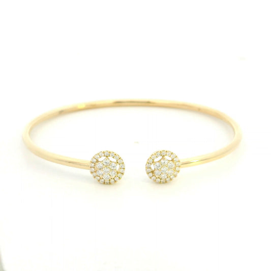 18K yellow gold open cuff bangle with two round natural diamond cluster ends.