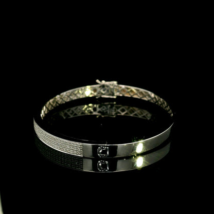 18K white gold multi-row diamond bangle set with 1.45 carats of natural round diamonds.