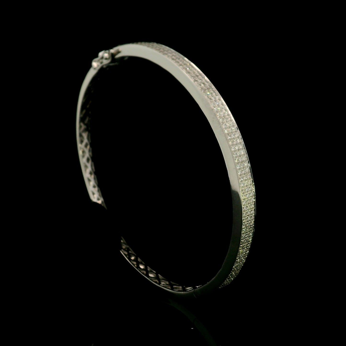 18K white gold multi-row diamond bangle set with 1.45 carats of natural round diamonds.