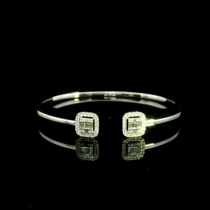 18K white gold open diamond bangle with round brilliant and baguette cut diamonds in matching square geometric ends
