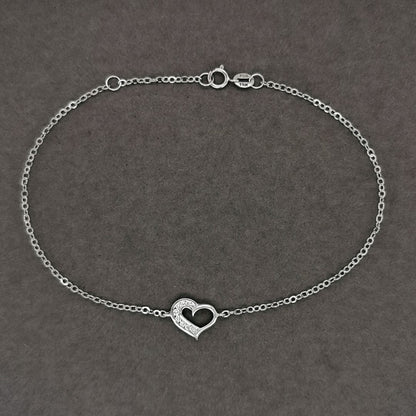 Diamond Heart Charm Bracelet In 18k White Gold.