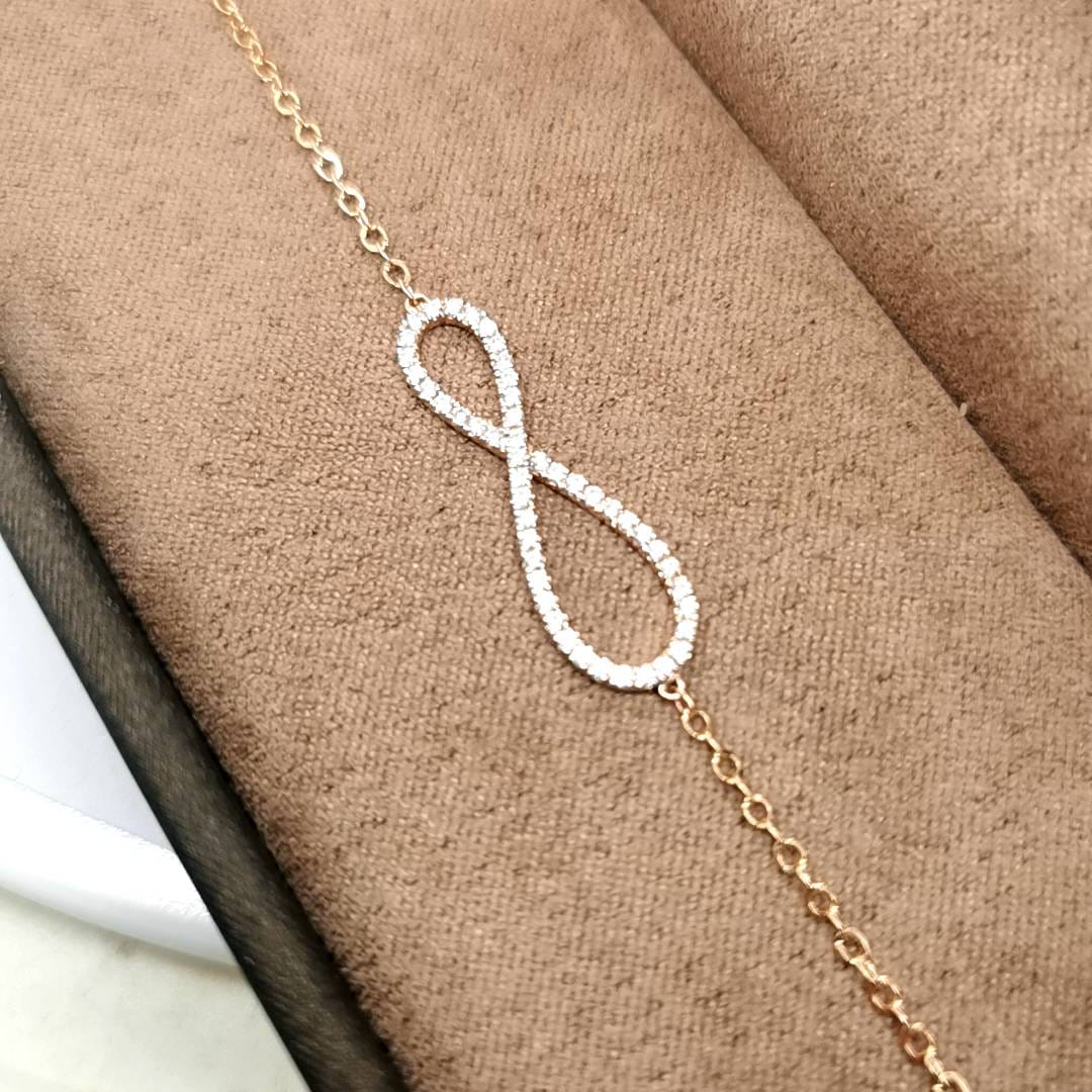 Infinity Symbol Diamond Bracelet In 18k Rose Gold.