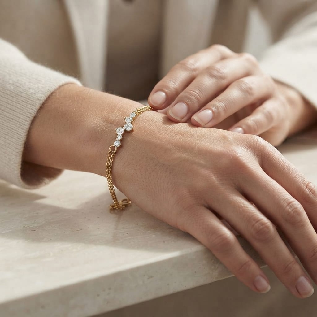 18K yellow gold double chain diamond bracelet with graduated round brilliant diamonds