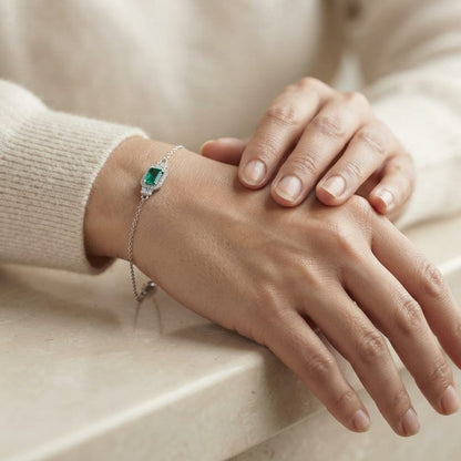 Emerald and Diamond Halo Bracelet in 18K Yellow Gold