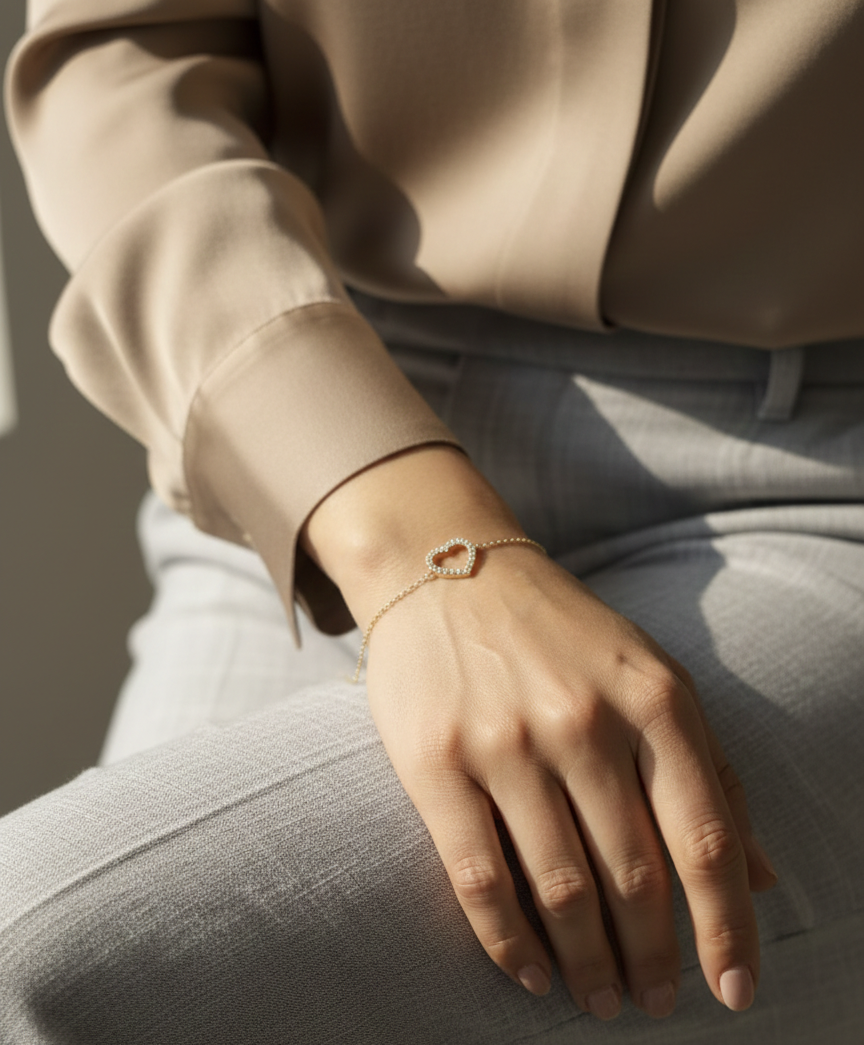 18K yellow gold open heart bracelet featuring pavé-set diamonds, total diamond weight 0.32 carat – Emirates Diamonds