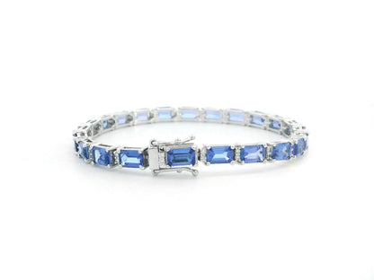 Close-up of tanzanite tennis bracelet with secure clasp detail
