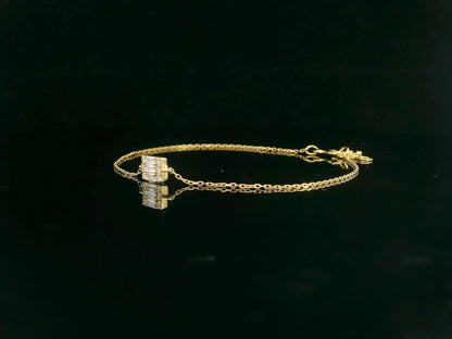 Minimalist diamond bracelet with rectangular setting in 18K yellow gold by Emirates Diamonds