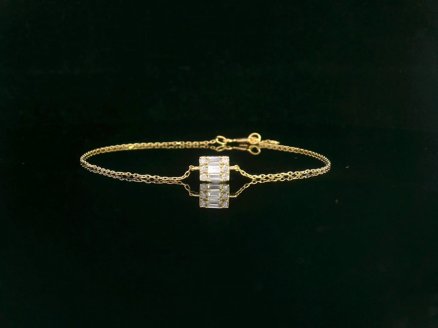 Minimalist diamond bracelet with rectangular setting in 18K yellow gold by Emirates Diamonds