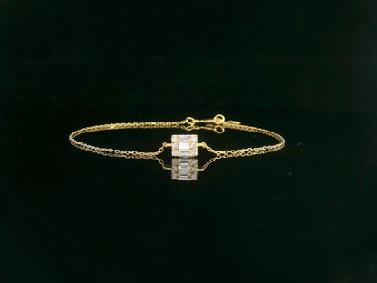 Minimalist diamond bracelet with rectangular setting in 18K yellow gold by Emirates Diamonds