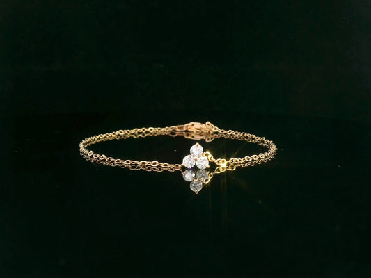 18K yellow gold chain bracelet with three round-cut diamond charm in triangular pattern – Emirates Diamonds