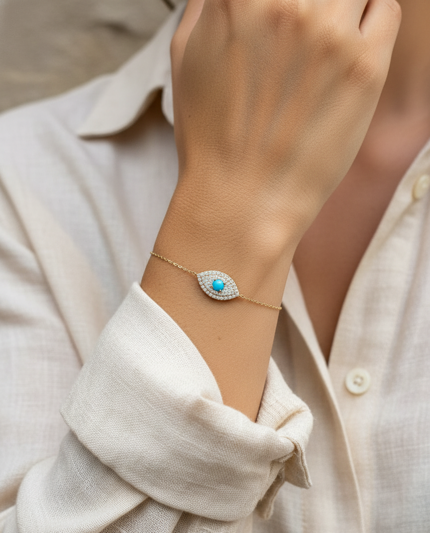18K yellow gold turquoise and diamond evil eye bracelet – pavé diamond halo with turquoise center by Emirates Diamonds.