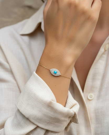 18K yellow gold turquoise and diamond evil eye bracelet – pavé diamond halo with turquoise center by Emirates Diamonds.