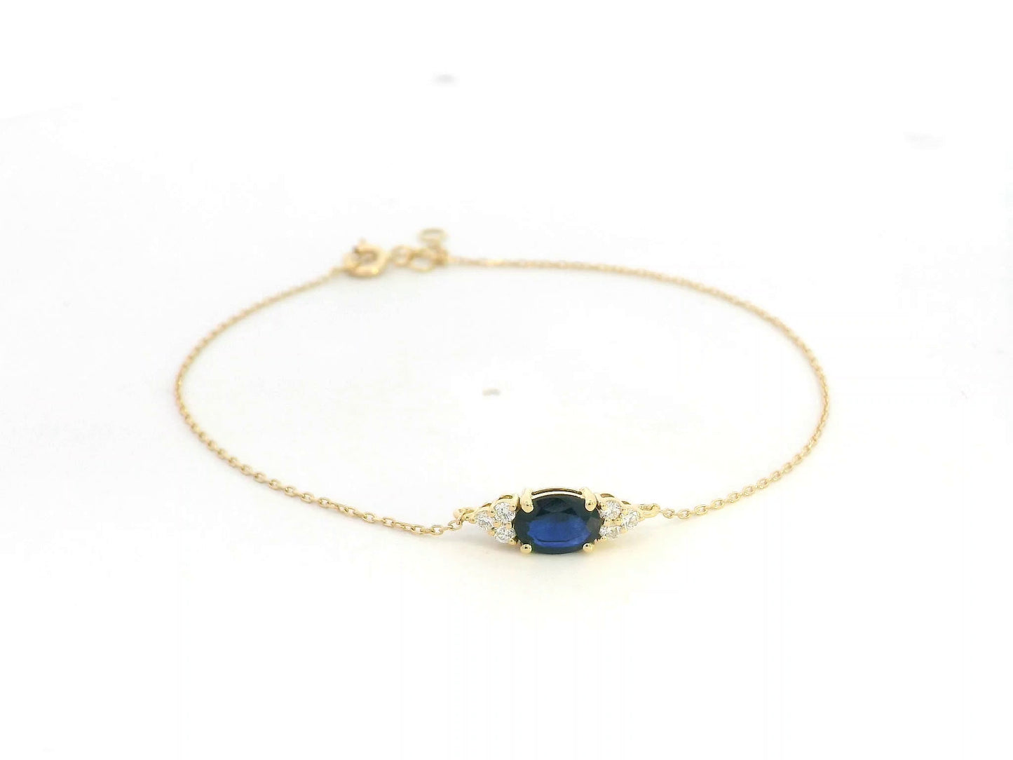 18K yellow gold bracelet with 0.84ct oval blue sapphire and 0.13ct diamonds – Emirates Diamonds