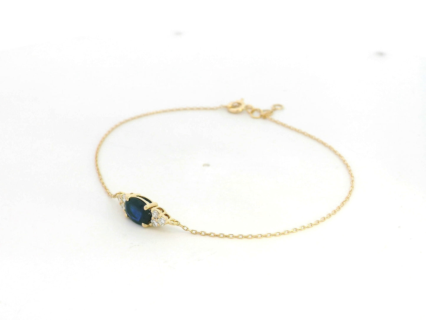 18K yellow gold bracelet with 0.84ct oval blue sapphire and 0.13ct diamonds – Emirates Diamonds