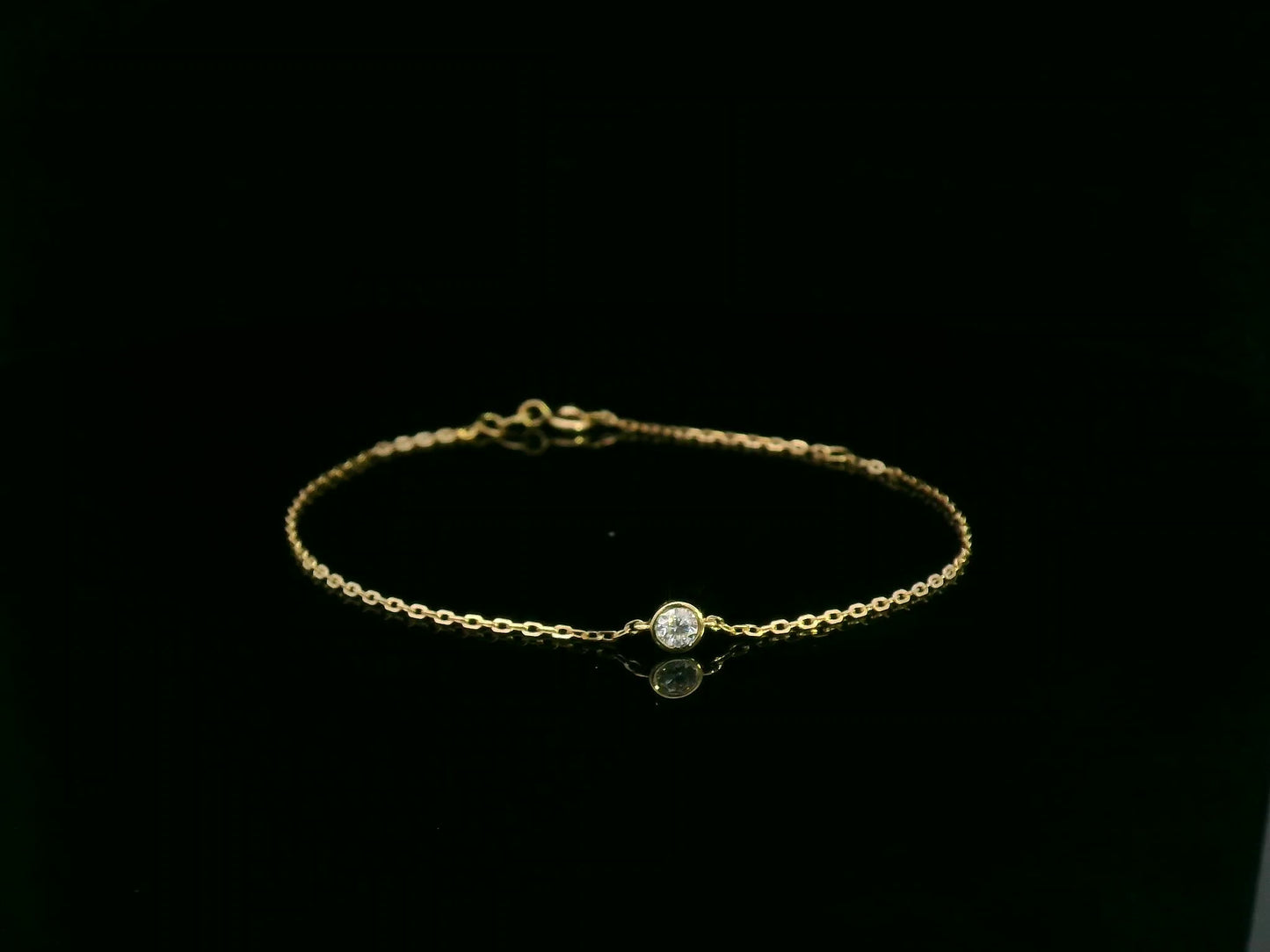 18K yellow gold diamond solitaire chain bracelet with bezel-set 0.14 carat diamond – Emirates Diamonds