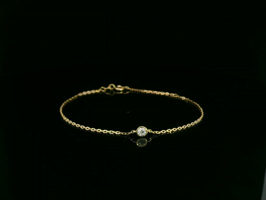 18K yellow gold diamond solitaire chain bracelet with bezel-set 0.14 carat diamond – Emirates Diamonds