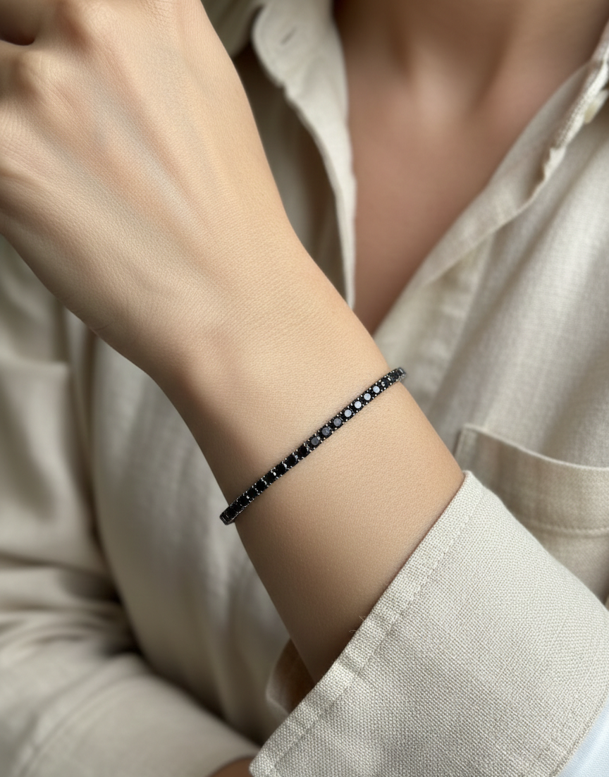 18K white gold tennis bracelet featuring 8.51 carats of natural black diamonds by Emirates Diamonds.