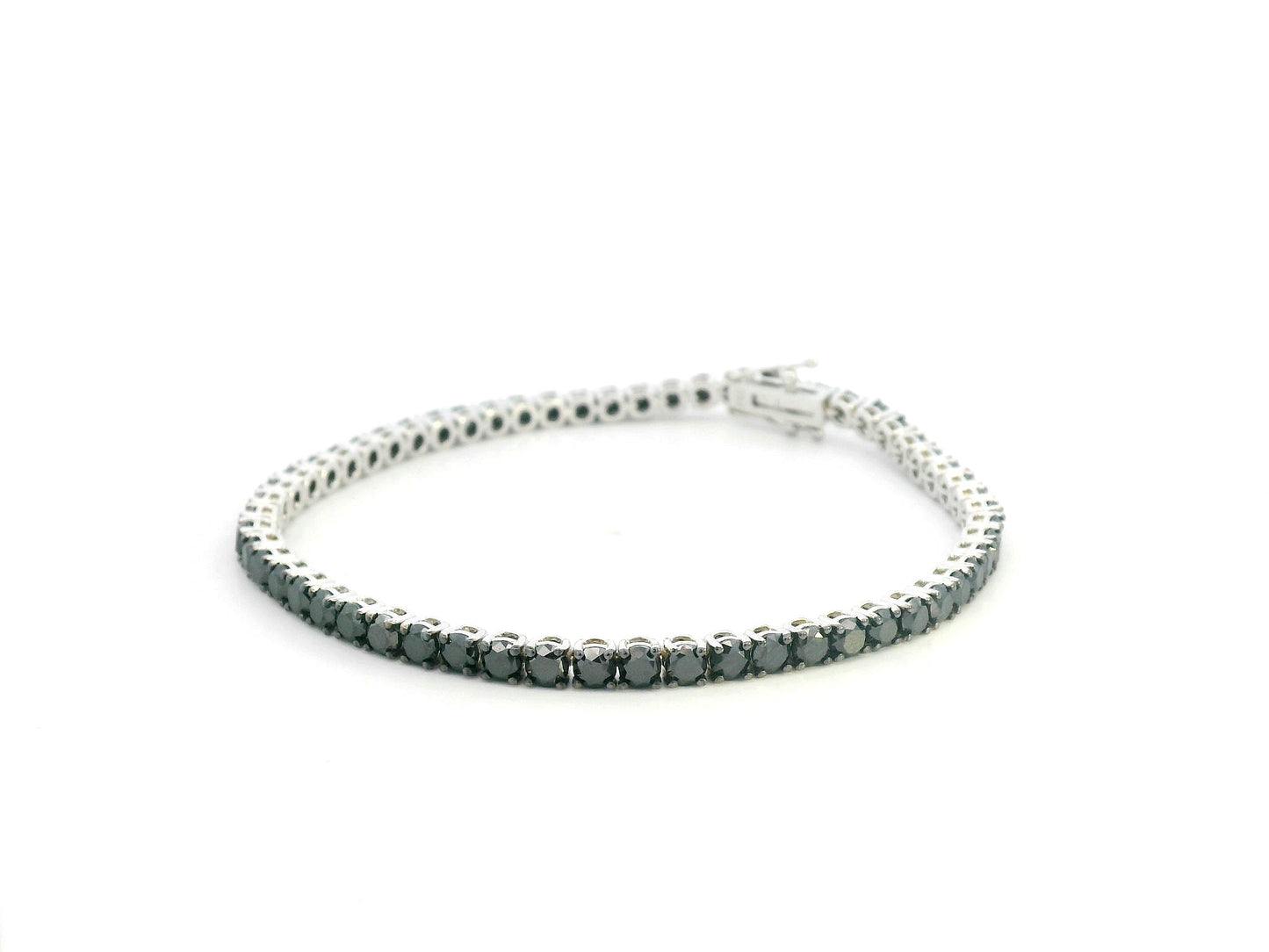 18K white gold tennis bracelet featuring 8.51 carats of natural black diamonds by Emirates Diamonds.