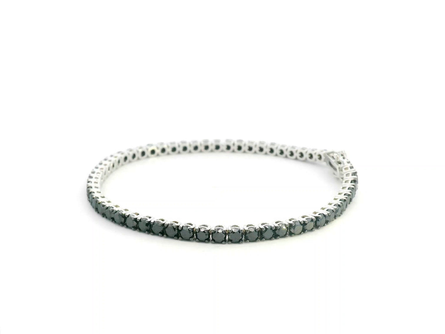 18K white gold tennis bracelet featuring 8.51 carats of natural black diamonds by Emirates Diamonds.